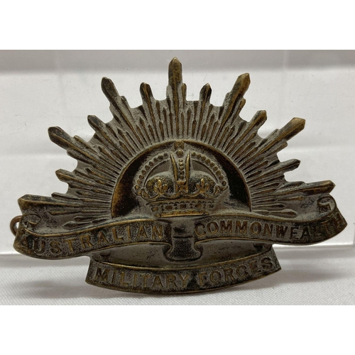 66 - A WWI style Australian A.N.Z.A.C. rising sun hat badge.  Approx. 6.5cm long.