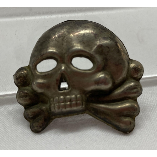 68 - A WWII style Allgemeine SS Totenkopf  skull and crossbones cap badge.  Approx. 3.5cm.