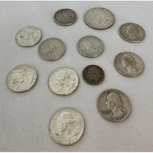 22 - A collection of silver (90%) and part silver (40%) American coins. Comprising: a 1956 dime, 10 x qua... 