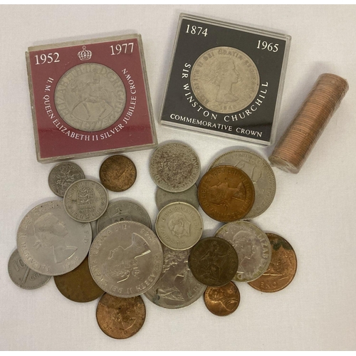 24 - A small collection of British and foreign coins. To include crowns & a sealed roll of ½ pence coins.