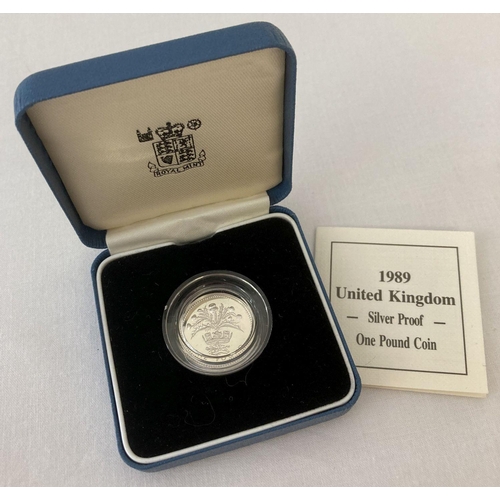 27 - A boxed English 925 silver £1 coin dated 1989 with COA. Complete with clear protective case.