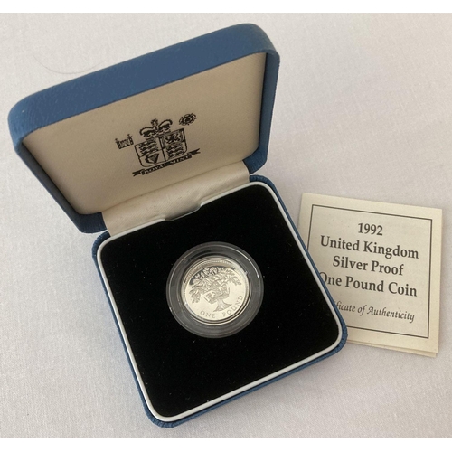 28 - A boxed Scottish 925 silver £1 coin dated 1992 with COA. Complete with clear protective case.