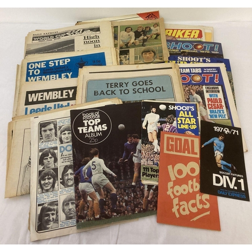 306 - A collection of early 1970's magazines, pamphlets and newspaper supplements relating to football. To... 