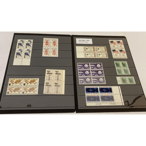 56 - A collection of 40 mint,1960 - 1976 postage stamps, from the USA. To include 