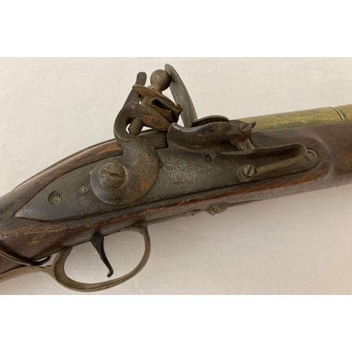 182 - An antique brass barrelled flintlock Blunderbuss.