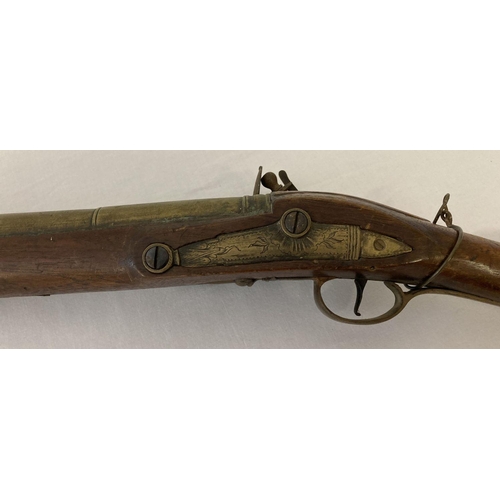 182 - An antique brass barrelled flintlock Blunderbuss.