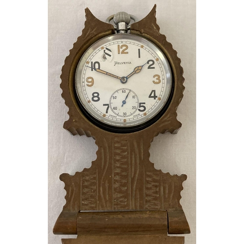 292 - A WWII Helvetia British Military pocket watch with carved wooden folding watch stand.  Top winding, ... 