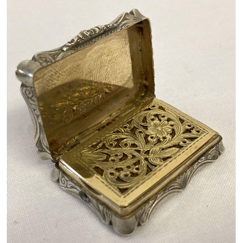 380 - A Victorian silver vinaigrette with silver gilt interior by Nathaniel Mills Birmingham 1843.  Floral... 