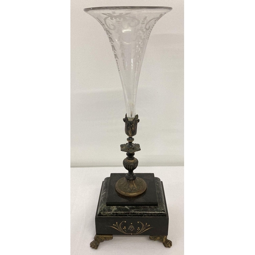 418 - An etched clear glass Victorian trumpet vase in decorative spelter stem mounted on a marble base.  S... 