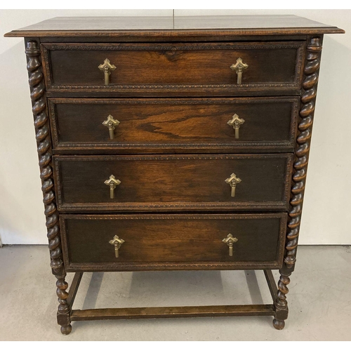 447 - An early 20th century solid dark oak 4 drawer chest with barley twist legs and column detail.  Origi... 