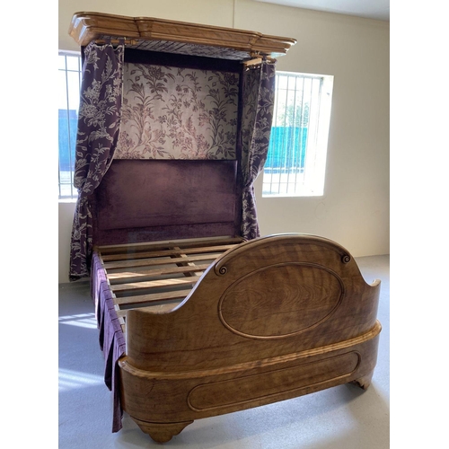 448 - A Victorian Walnut half tester King size bed with curved footboard and canopy.  Recently upholstered... 