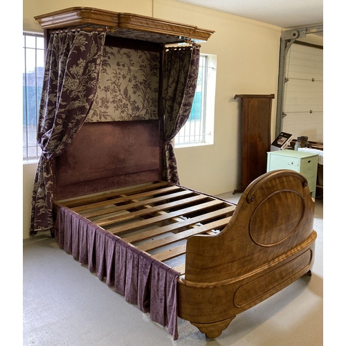 448 - A Victorian Walnut half tester King size bed with curved footboard and canopy.  Recently upholstered... 