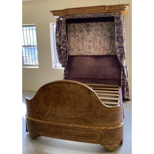 448 - A Victorian Walnut half tester King size bed with curved footboard and canopy.  Recently upholstered... 