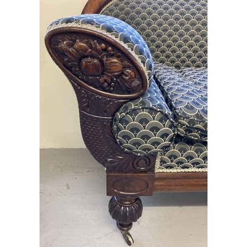 449 - A decorative Victorian mahogany settee with carved panels to arms and turned legs.  Recently upholst... 