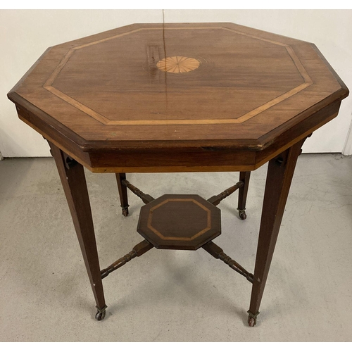 453 - An Edwardian hexagonal occasional table with inlay detail to top.  On tapered legs and with lower sh... 