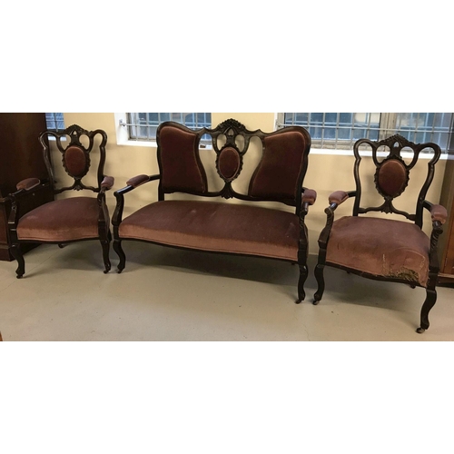 455 - A Victorian 2 seater wooden framed Parlour suite; settee with 2 matching arm chairs.  With carved de... 