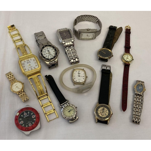 1111 - A box of ladies and men's wristwatches in varying styles and conditions.  To include: Montine, HP, L... 