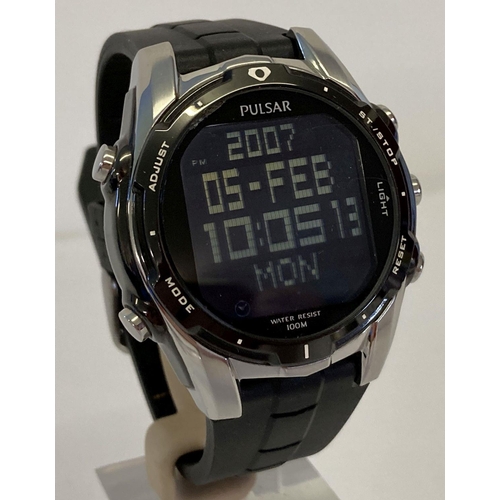 1118 - A men's chronograph digital watch by Pulsar.  Stainless steel case with black silicone strap. Workin... 