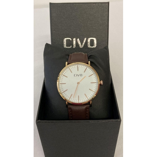 1127 - A boxed men's wrist watch by Civo. White dial with gold tone case, hours markers and hands.  Brown l... 