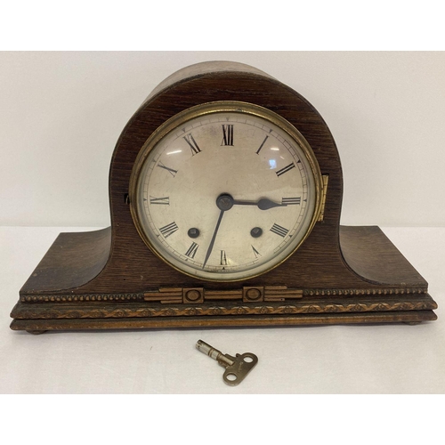 1150 - A vintage dark wood cased Bravingtons Ltd clock with Empire movement.  Key present, no pendulum. Nee... 