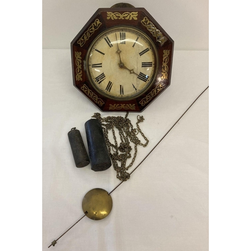 1154 - A 19th century octagonal shaped 'wag on the wall' clock with brass inlay.  Painted wooden face with ... 