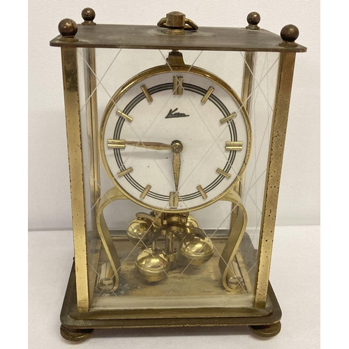 1166 - A vintage German brass cased Kern torsion pendulum Anniversary clock.   Approx. 18.5cm tall.