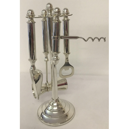 1168 - A modern silver plated bar/cocktail tools set with display stand.   Total height approx. 27cm tall.