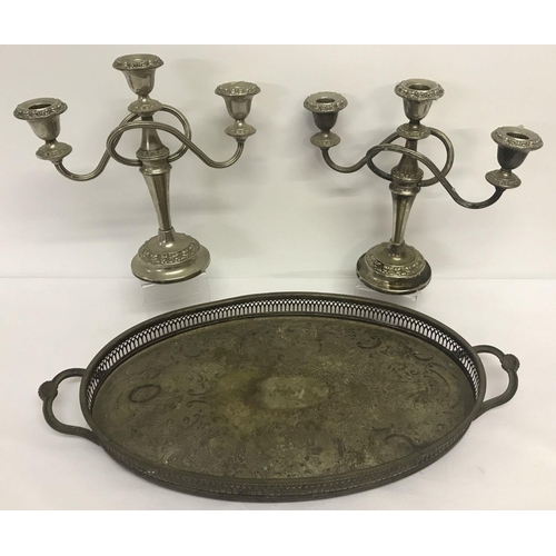 1171 - A pair of twist arm design silver plated candelabras.  Together with a decorative galleried silver p... 