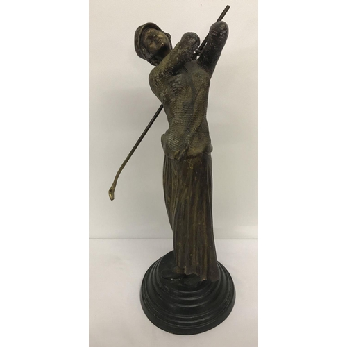 1208 - A large Art Deco bronze figurine of a female golfer on a stepped base.   Approx. 52cm tall.