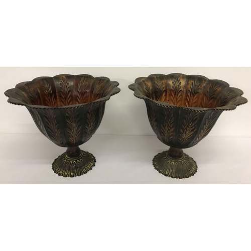 1216 - A pair of vintage decorative metal planters with brown/orange painted detail.   Approx. 27cm tall x ... 