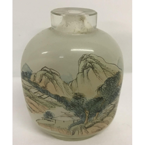 1298 - A small glass internal painted oriental scent bottle, stopper missing.  Depicting men riding horses ... 