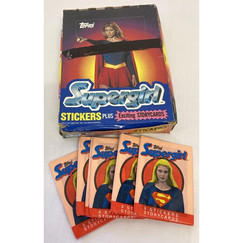 19 - A full box of unopened 36 wax sealed packs of Topps Supergirl stickers & story cards from 1984.