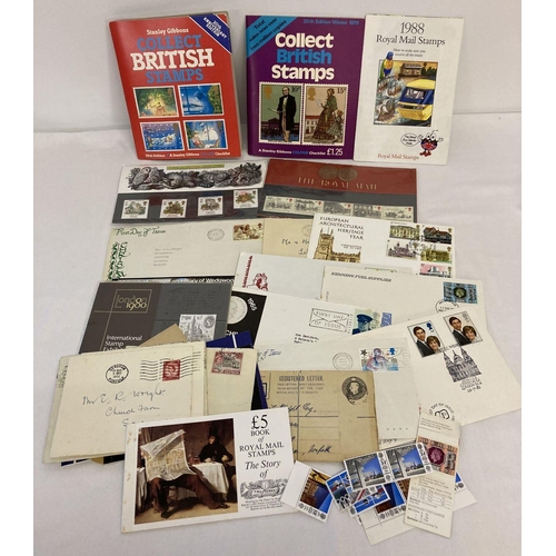 199 - A small collection of collectors stamp sets and books, first day covers and loose used stamps.  Toge... 