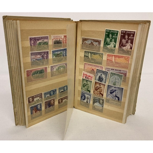 209 - A small vintage album containing antique and vintage postage stamps, mostly unused.  To include Vict... 