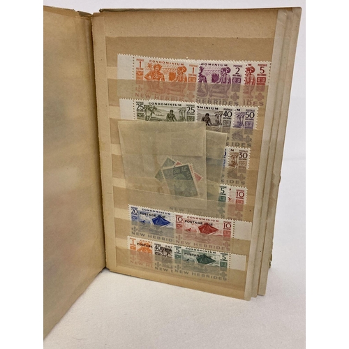 209 - A small vintage album containing antique and vintage postage stamps, mostly unused.  To include Vict... 