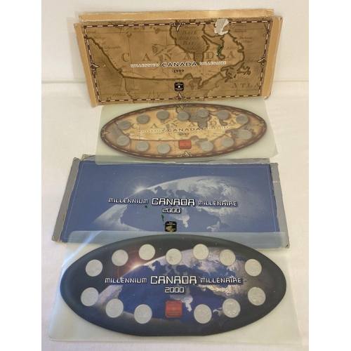 26 - 2 Royal Canadian Mint Millennium 25 cent sets in original board mounts.  Complete with plastic cover... 