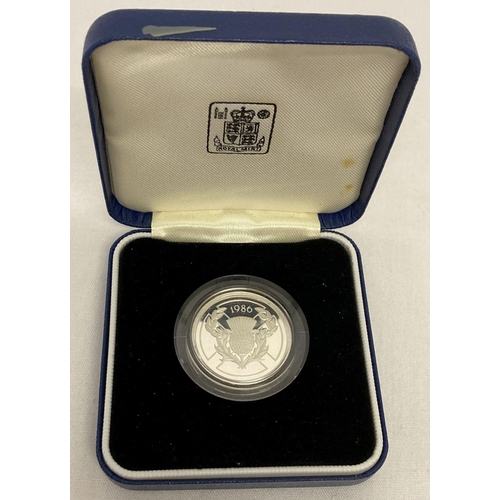 81 - A boxed and cased 1986 silver proof £2 coin made to commemorate the XIII Commonwealth Games.  With T... 