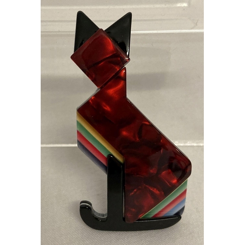 1003 - A Lea Stein style coloured Lucite pin back brooch in the shape of an Art Deco design cat.