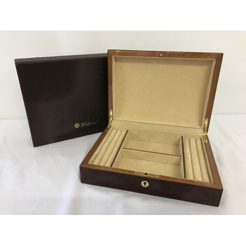 1006 - A new and boxed red Birdseye maple jewellery box by Walwood.  Cream velveteen lining with ring/earri... 