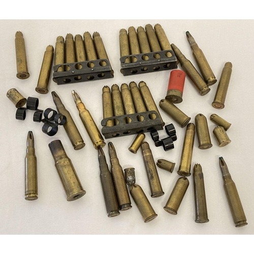 106 - A collection of blank bullets. 21 x .303, 15 housed in No. 4 clips. Together with 8 x 7.62 NATO to i... 
