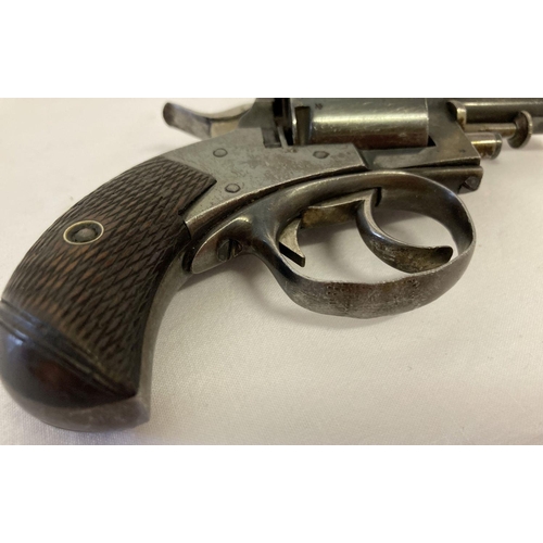 118 - An antique 1898 Webley No. 2 centrefire .320 revolver with wooden grip. Engraved to top S. W. Silver... 