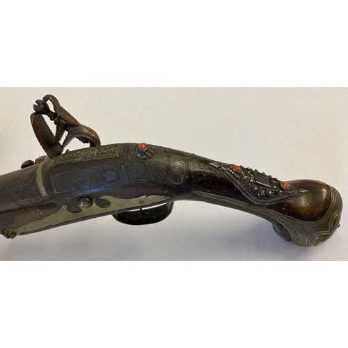 132 - A late 17th Century Spanish flintlock pistol with Spanish Armourers mark on the barrel.Decorative in... 