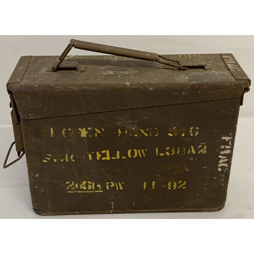 146 - A British 7.62 L38/2 ammunition tin with carry handle. Embossed detail to one end H82 MK1 SF JLY 58 ... 