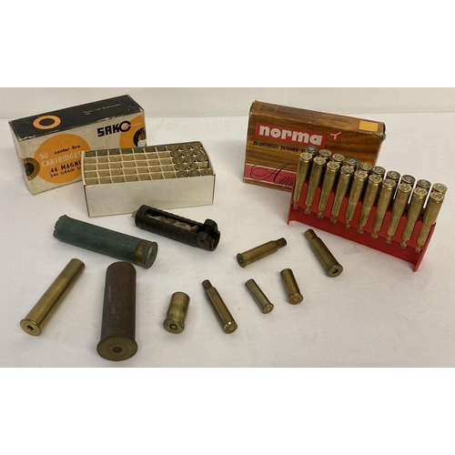 150 - A collection of cartridge cases. Comprising: 8 bore, .357 magnum, LIA4 mortar blank, .348 Win 7.9 x ... 