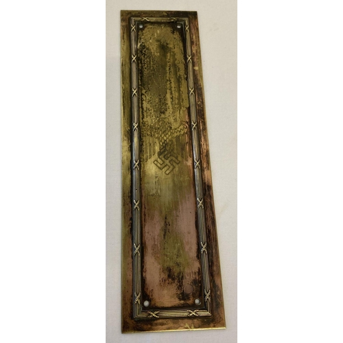 159 - A decorative brass fingerplate with German WWII style engraved detail.  Approx. 29cm x 7.5cm.