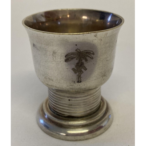 168 - A silver plated WWII style schnapps cup with engraved detail for the German Africa Corps.  Approx. 5... 