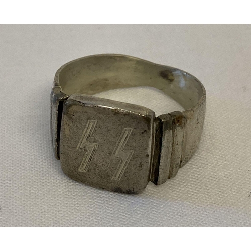 176 - A WWII style white metal ring with SS engraved detail to cartouche.  Ring size V.