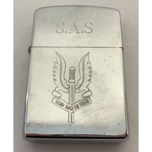 178 - A modern windproof lighter with engraved S.A.S. 
