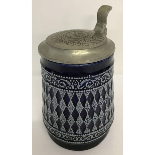 216 - A Marzi & Remy German ceramic beer stein with deep blue glaze and pewter lid. Lid engraves with WWII... 
