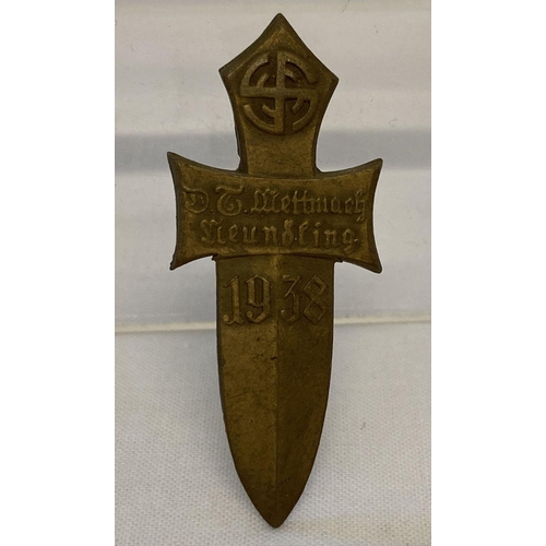 37 - A WWII style Austrian Rally pin back badge, with 1938 date, in the shape of a dagger.  Approx. 5cm l... 